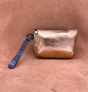 KUSAMA: Leather Clutch Bag Collection