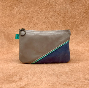 Split front leather purse in ghost and blue.